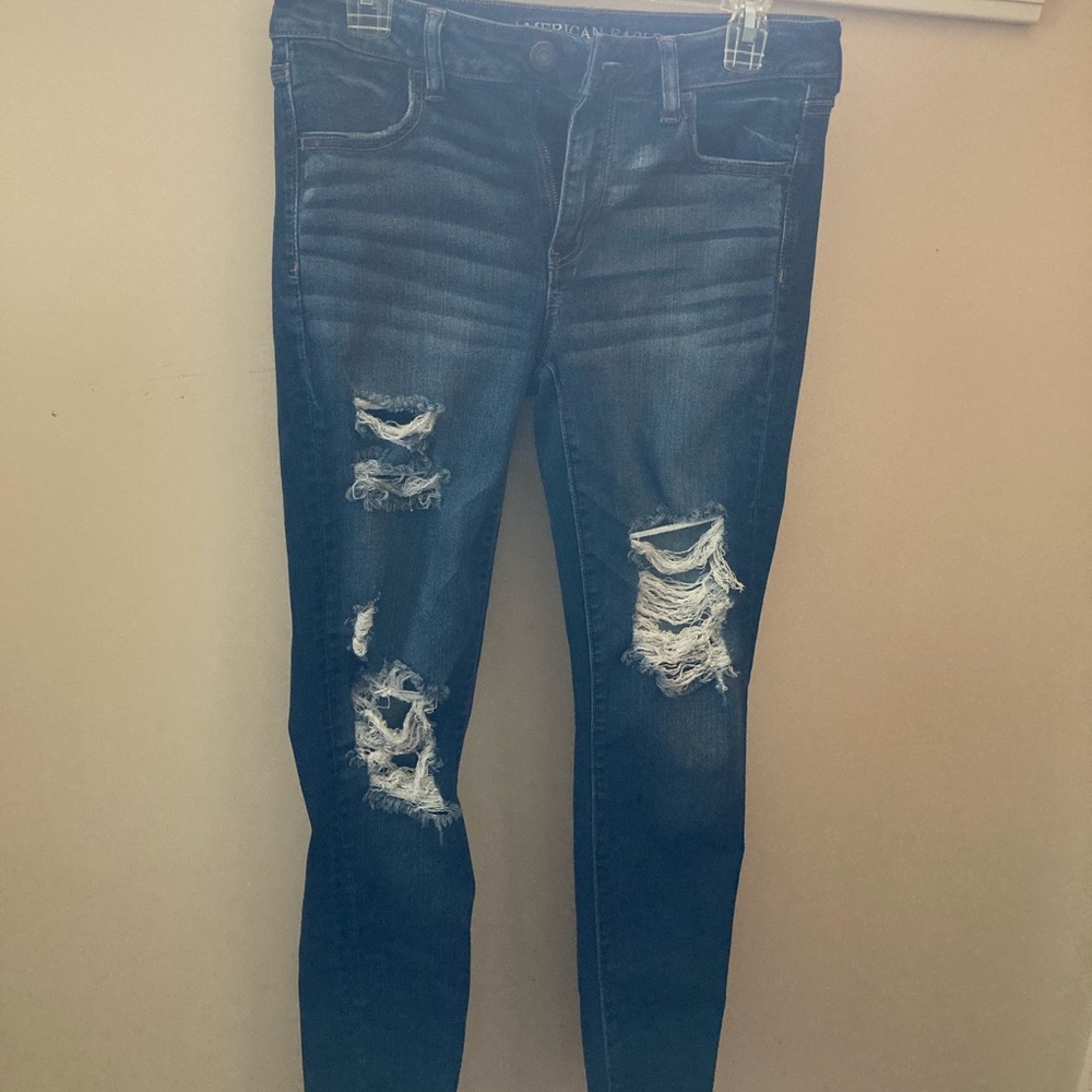AE super stretch X dark wash midrise distressed jeggings